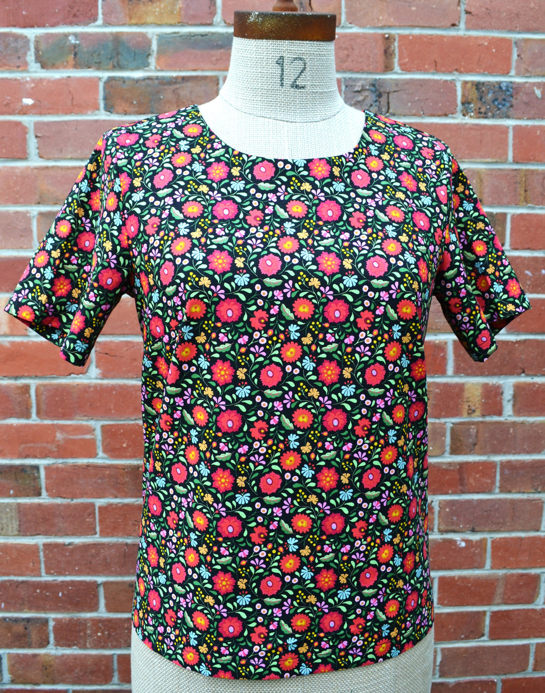 Berserk Folk floral keyhole top